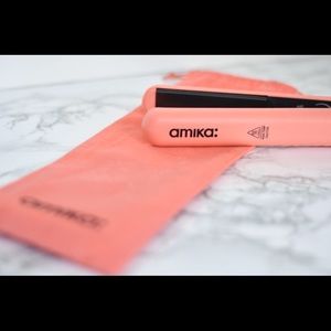 Amika ceramic flat iron in limited edition coral